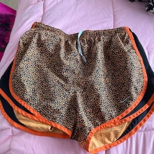 Nike Women's Black and Orange Athletic Shorts